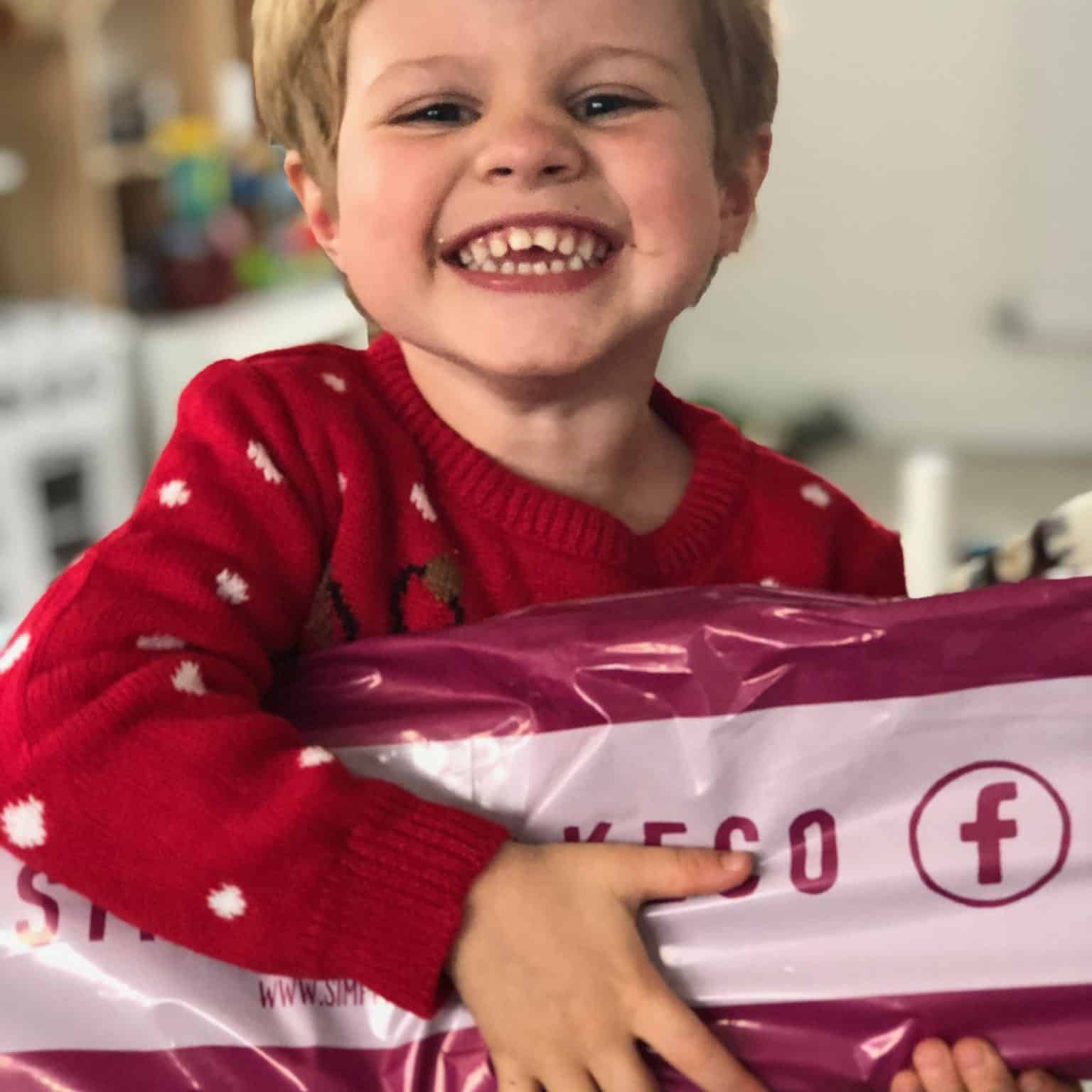 Image of a happy child with our brownie delivery
