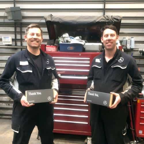 Image of Mercedes workers accepting our corporate gifts