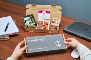 Elegant thank you gift box with assorted treats and personalised branding for corporate gifting.
